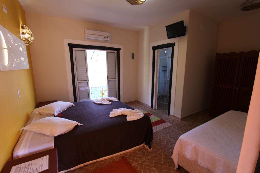 Pousada Casa de Pedra Boiçucanga Habitación foto